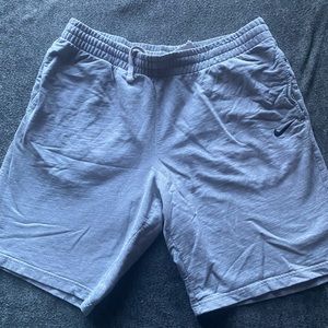 Gray Nike shorts.